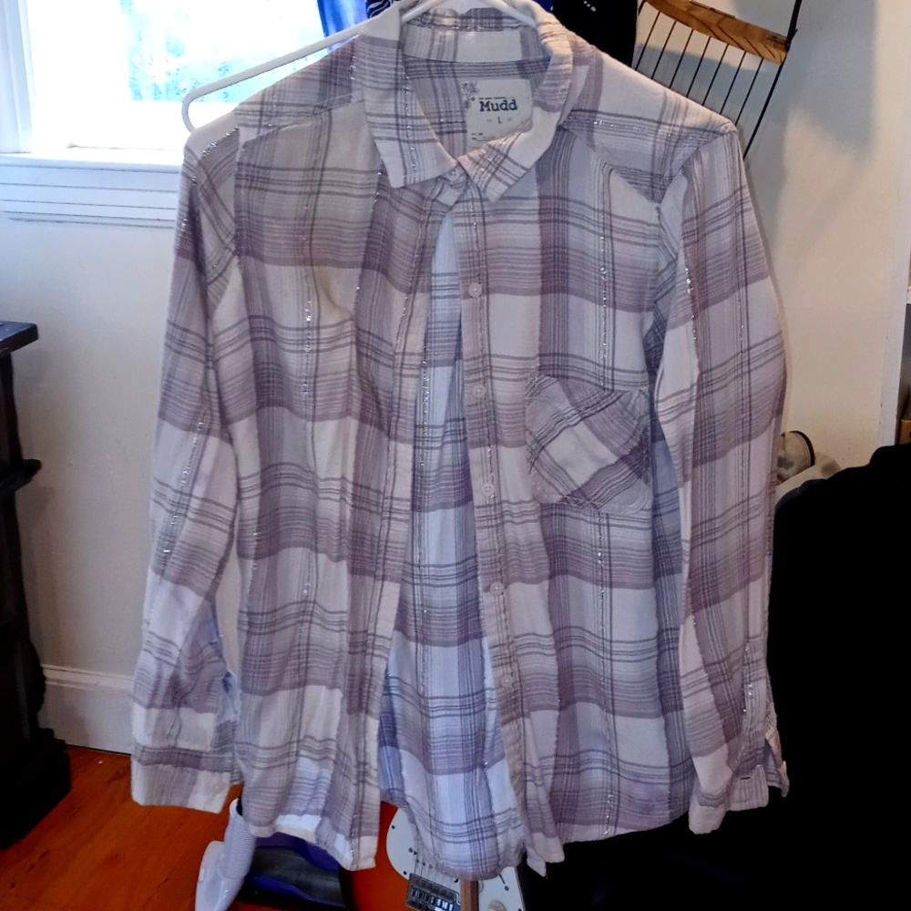 Button up shirt it's pink and darker shades of pink with silver going through it